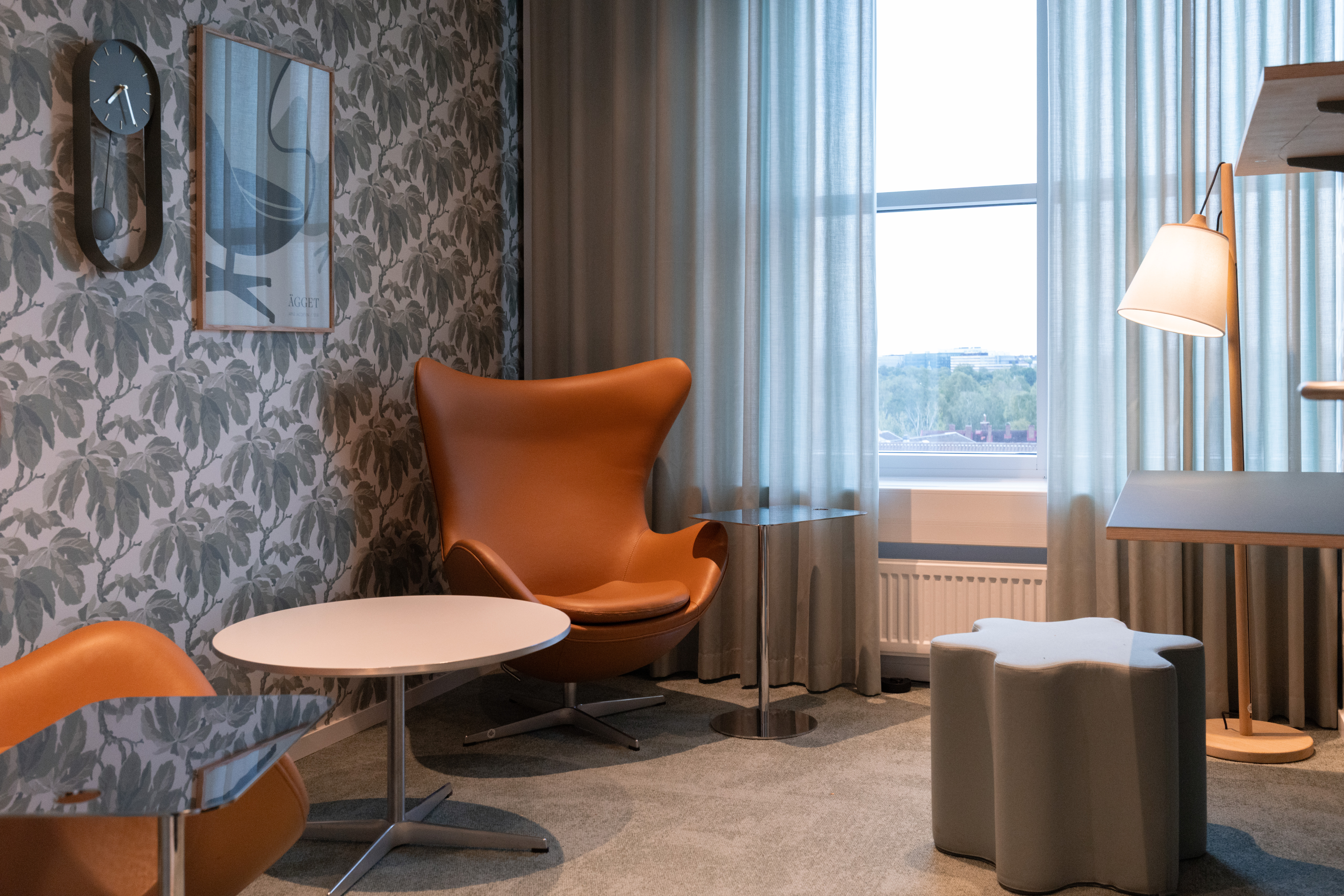 Decorative conference room from Coor's HQ with designed chairs and flowery wallpaper