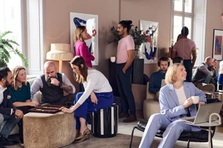 Group of people having a break in a lounge area
