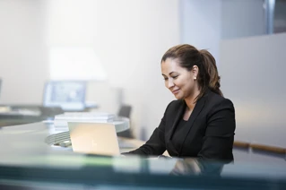 Woman working with a computer in a reception
